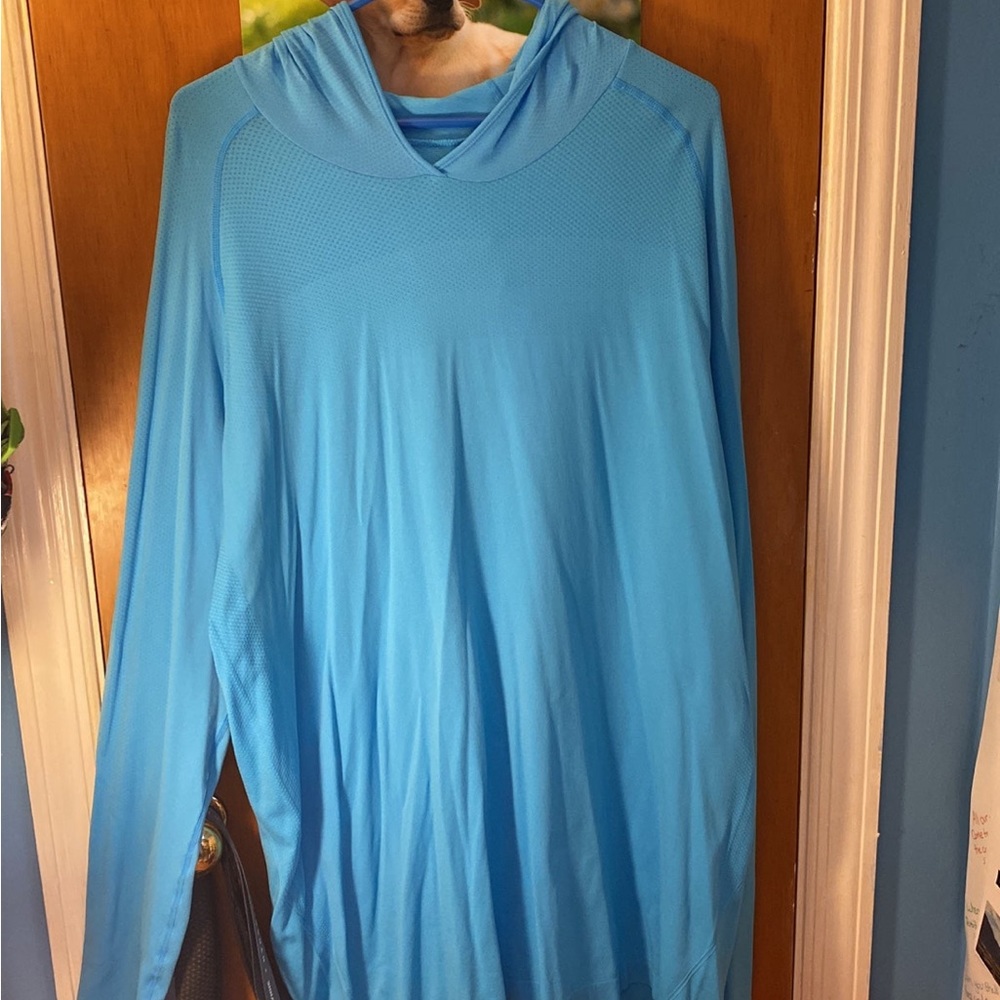 ZYIA Men’s sky blue performance hoodie.